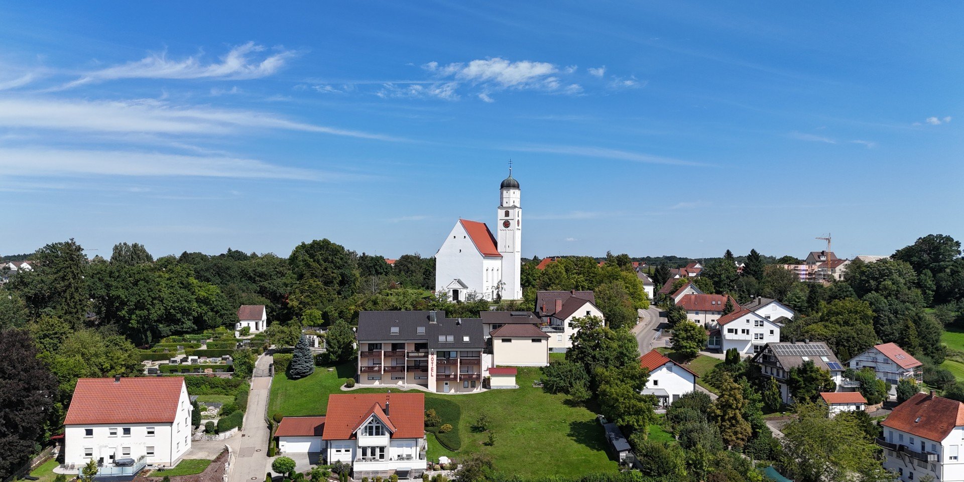 Haus verkaufen in Vöhringen: Wohnhäuser und Gärten von oben