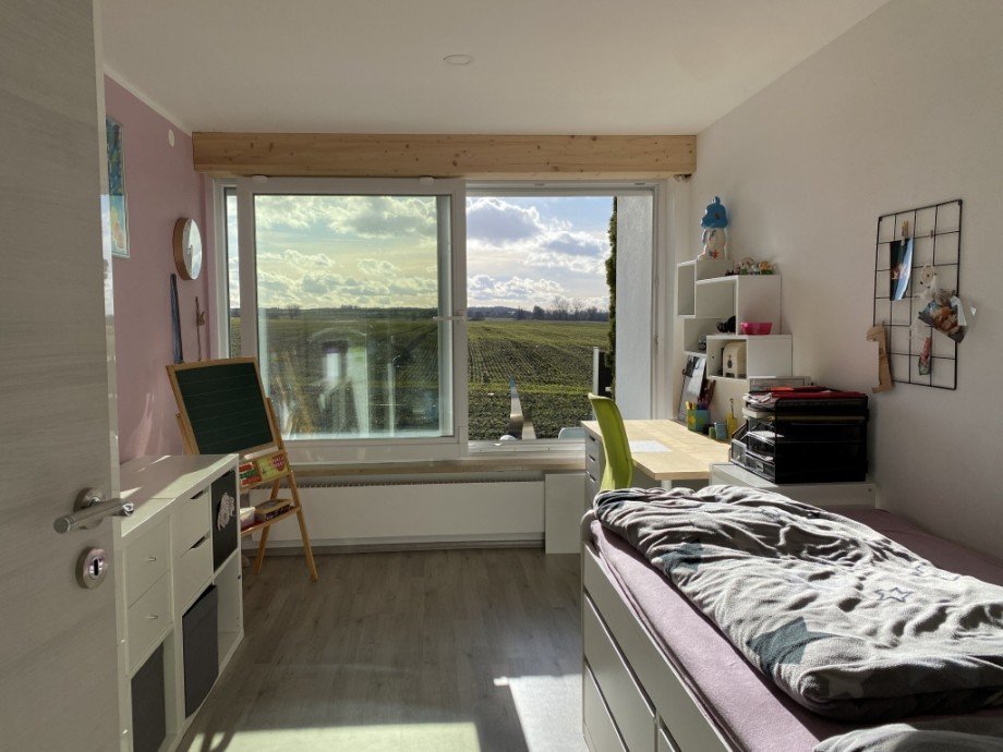Kinderzimmer im EG (Bild 1) Zweifamilienhaus Neu-Ulm